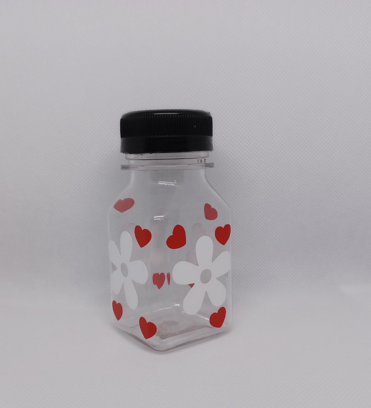 Red hearts. 4oz Plastic Bottle